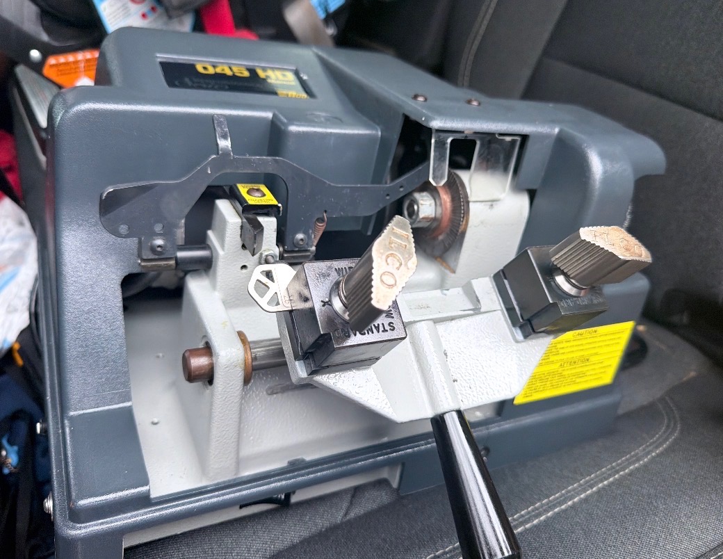 Professional key-cutting machine inside the Hyder & Son van